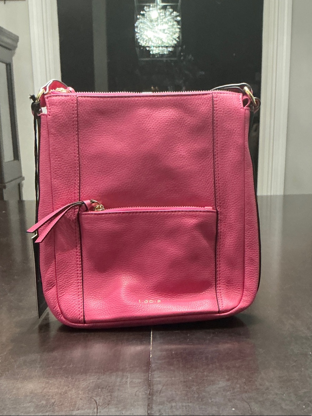Lodis Fuchsia Pebbled Leather Crossbody Bag